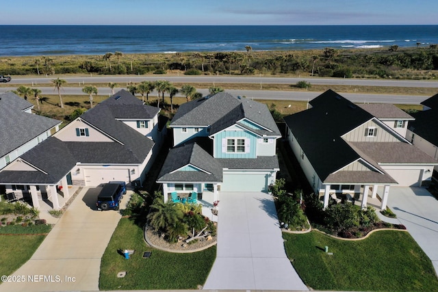 aerial view featuring a water view