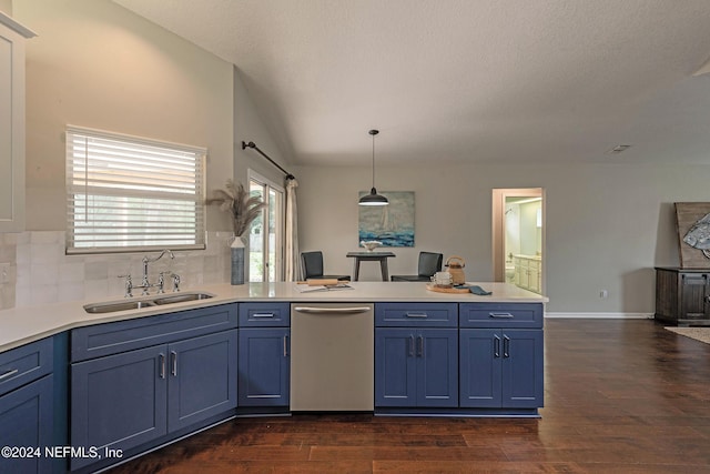 kitchen with hanging light fixtures, dishwasher, sink, and dark wood-type flooring