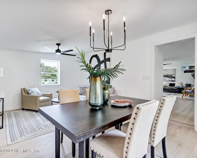 dining space featuring ceiling fan