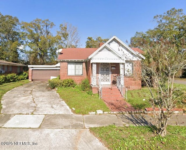 bungalow-style home with a garage