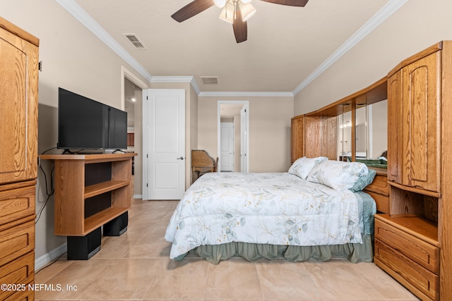 tiled bedroom featuring ornamental molding and ceiling fan