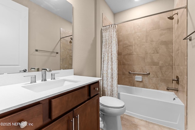 full bathroom featuring vanity, toilet, tile patterned flooring, and shower / bath combo