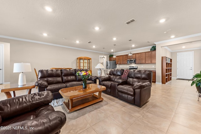 living room with crown molding and light tile patterned flooring