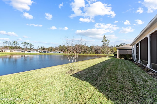 view of yard with a water view