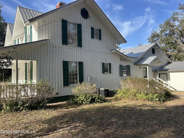 view of side of property featuring cooling unit