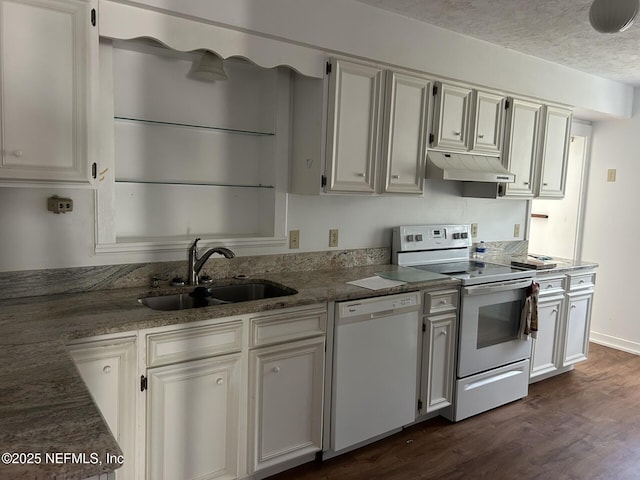 kitchen featuring white cabinetry, sink, and white appliances