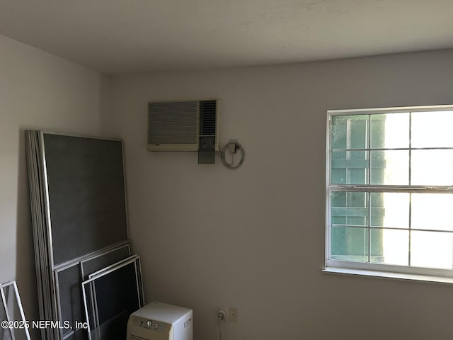 interior space featuring a wall mounted AC