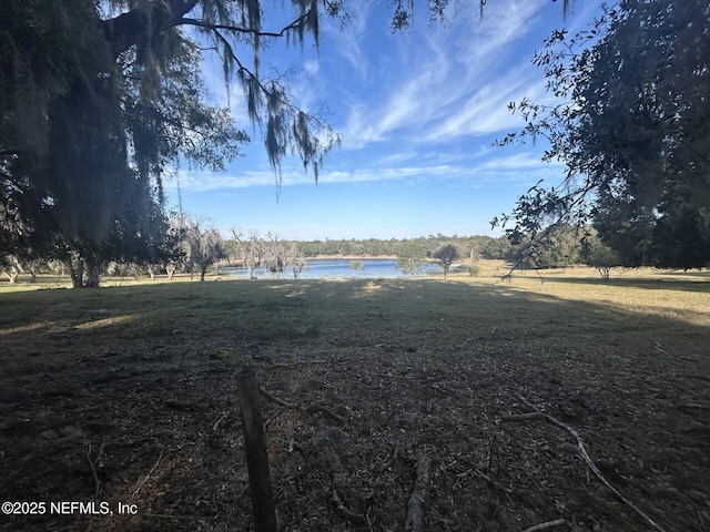 view of yard featuring a water view