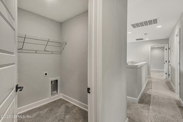 laundry room featuring electric dryer hookup