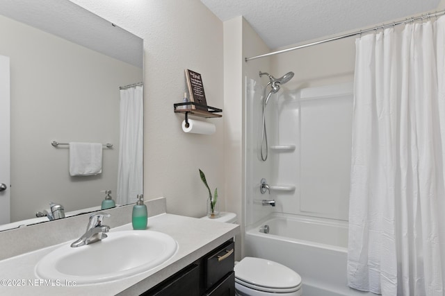 full bathroom with vanity, toilet, a textured ceiling, and shower / bath combo