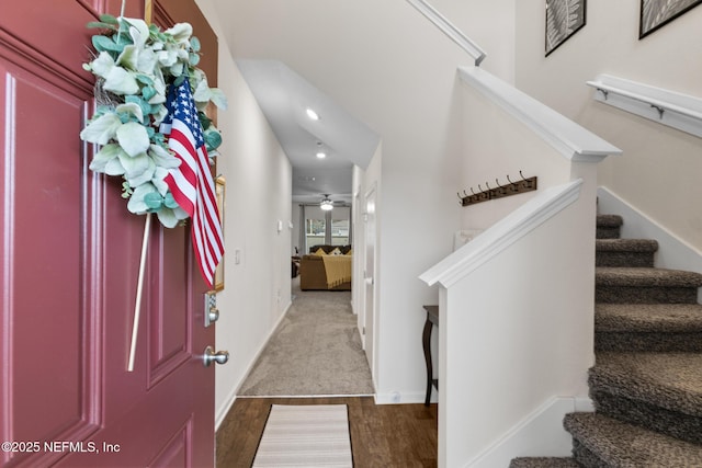 entryway with hardwood / wood-style flooring and ceiling fan