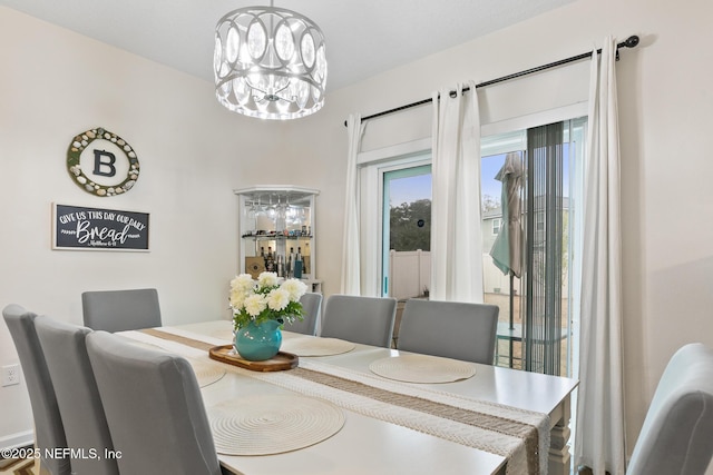 dining room featuring an inviting chandelier