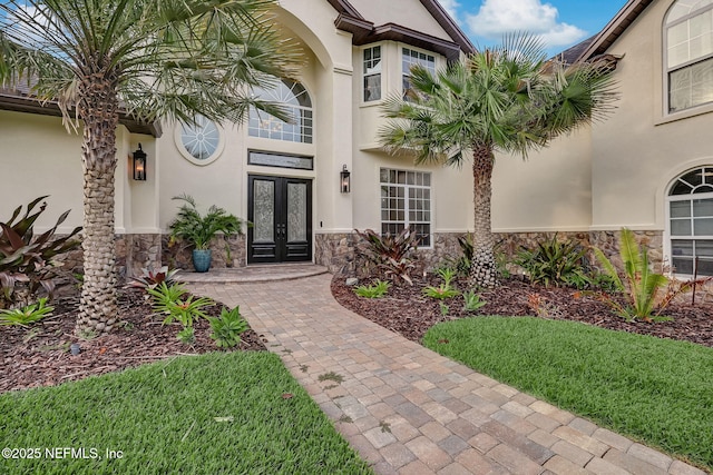 doorway to property with french doors