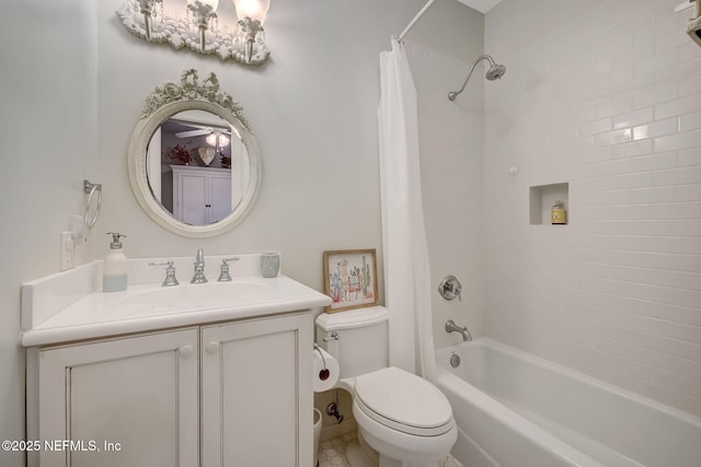 full bathroom with vanity, shower / bath combination with curtain, and toilet