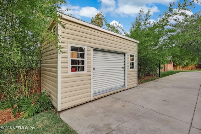 view of outdoor structure featuring a garage