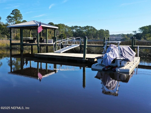 view of dock with a water view and a gazebo