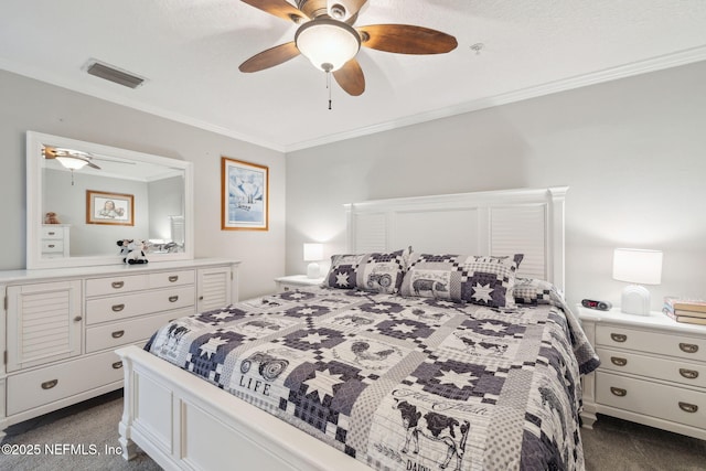 bedroom featuring crown molding, ceiling fan, dark carpet, and a textured ceiling