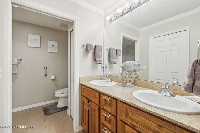 bathroom featuring crown molding, tile patterned floors, toilet, and vanity