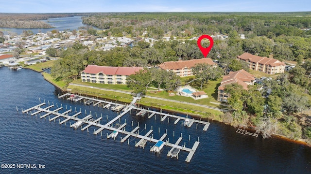 birds eye view of property featuring a water view