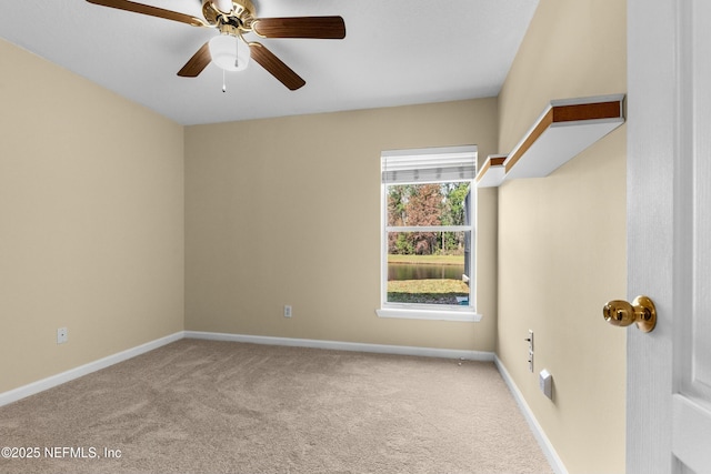 unfurnished room with carpet floors and ceiling fan