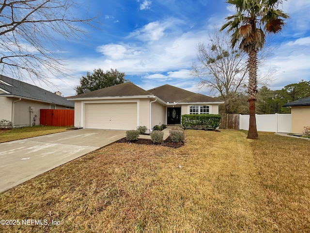 ranch-style home with a garage and a front lawn