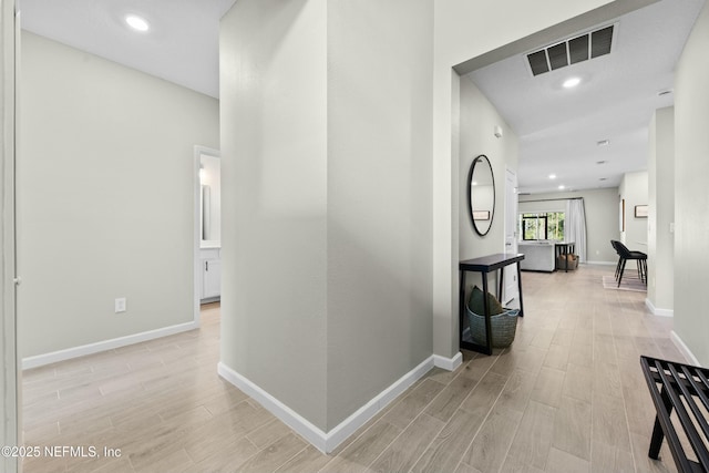 hallway featuring light wood-type flooring