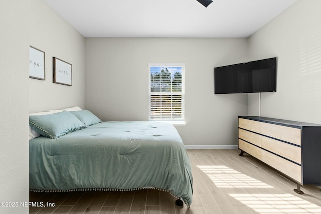 bedroom featuring light hardwood / wood-style floors