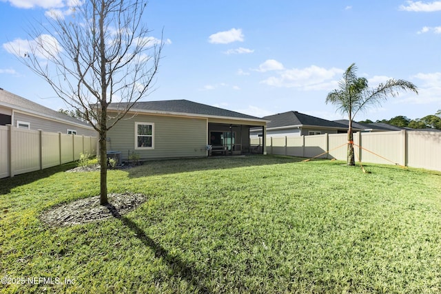 view of yard featuring a sunroom