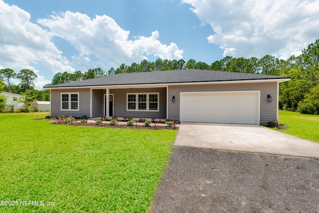 single story home featuring a garage and a front lawn