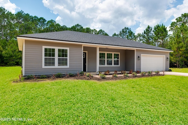 single story home with a garage and a front yard