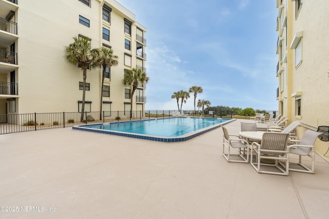 view of pool with a patio area