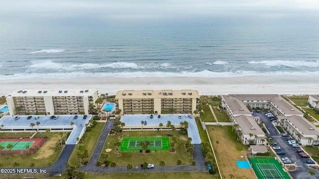 aerial view featuring a beach view and a water view