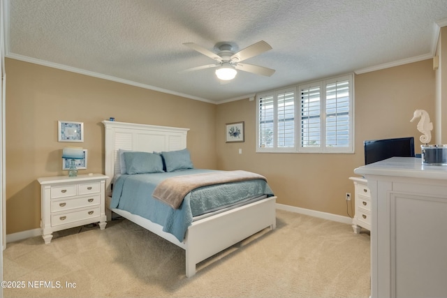 bedroom featuring crown molding, ceiling fan, light carpet, and a textured ceiling