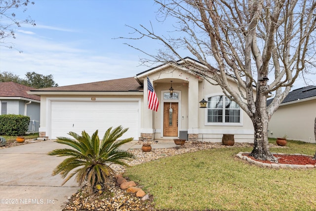 single story home featuring a garage and a front yard