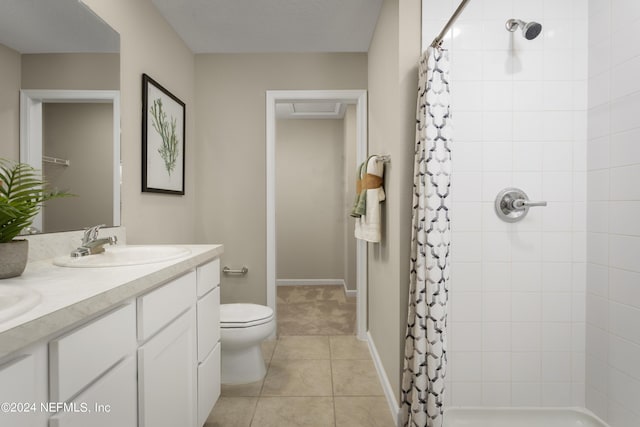 bathroom with vanity, toilet, tile patterned floors, and a shower with curtain