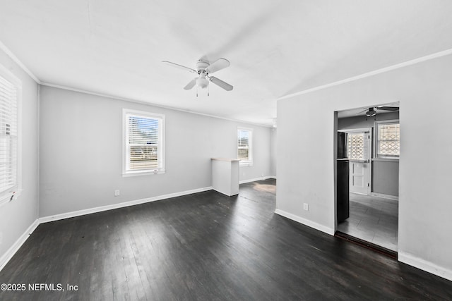 unfurnished living room with ceiling fan, dark wood-type flooring, and a healthy amount of sunlight