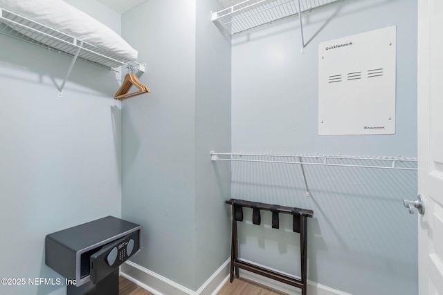 walk in closet featuring wood-type flooring