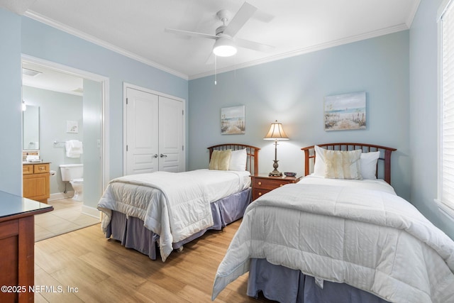 bedroom with light hardwood / wood-style floors, ornamental molding, a closet, and ceiling fan