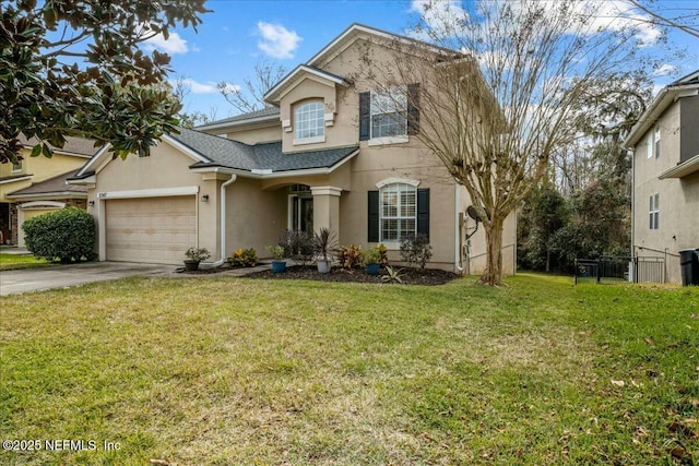 front of property with a garage and a front lawn