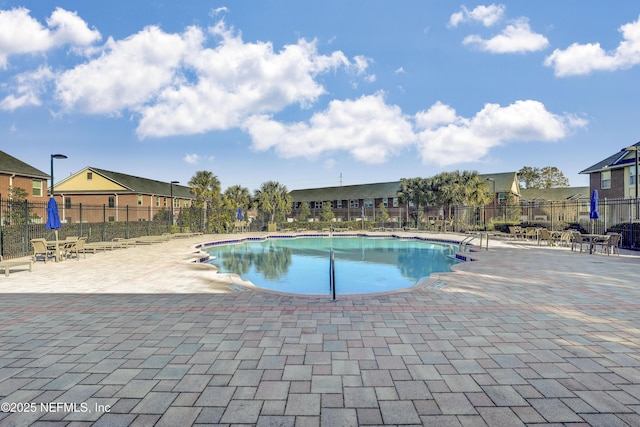 view of pool featuring a patio