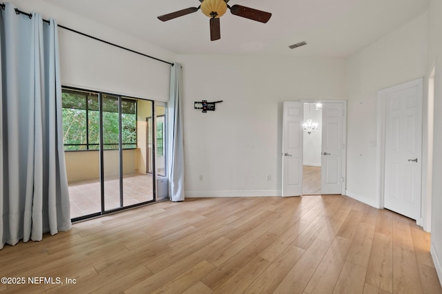 interior space with ceiling fan and light hardwood / wood-style flooring