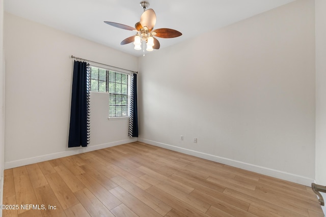 unfurnished room with ceiling fan and light hardwood / wood-style flooring