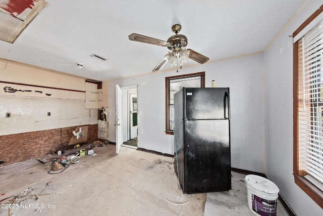 kitchen featuring black refrigerator and ceiling fan