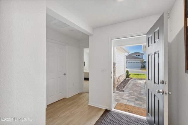 entrance foyer featuring light wood-type flooring