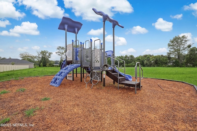 view of jungle gym featuring a yard