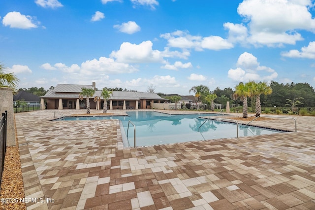 view of pool featuring a patio