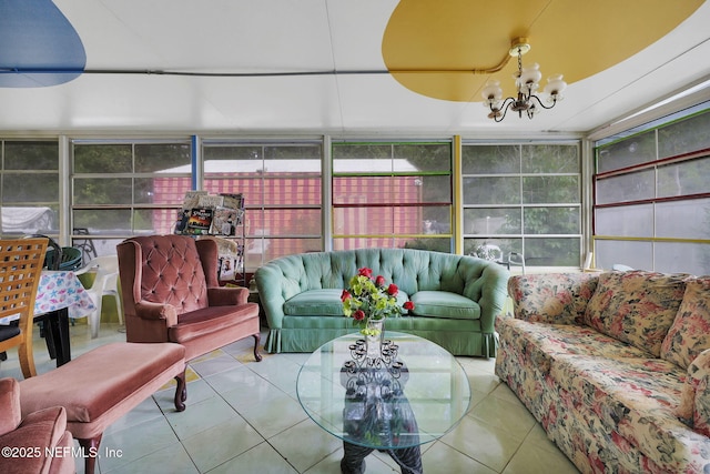 sunroom featuring an inviting chandelier