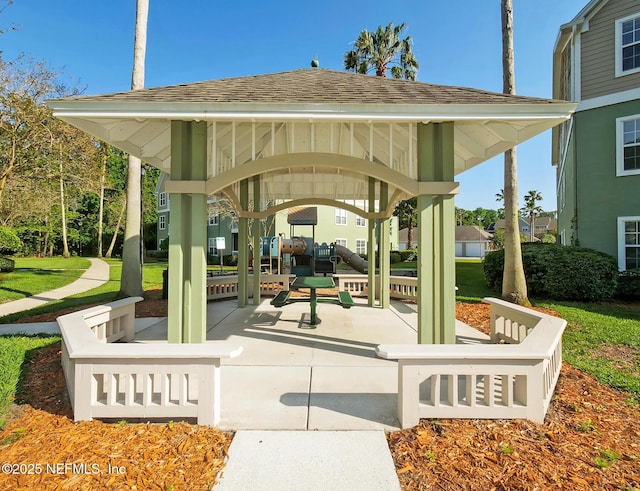 view of community with a gazebo and a yard