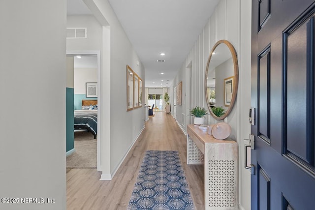 corridor featuring light wood-type flooring