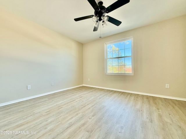 unfurnished room with light hardwood / wood-style flooring and ceiling fan